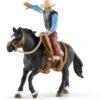 Schleich 41416 Western Cowboy In Het Zadel Farm World -Berg Winkel schleich 41416 westerncowboy in het zadel